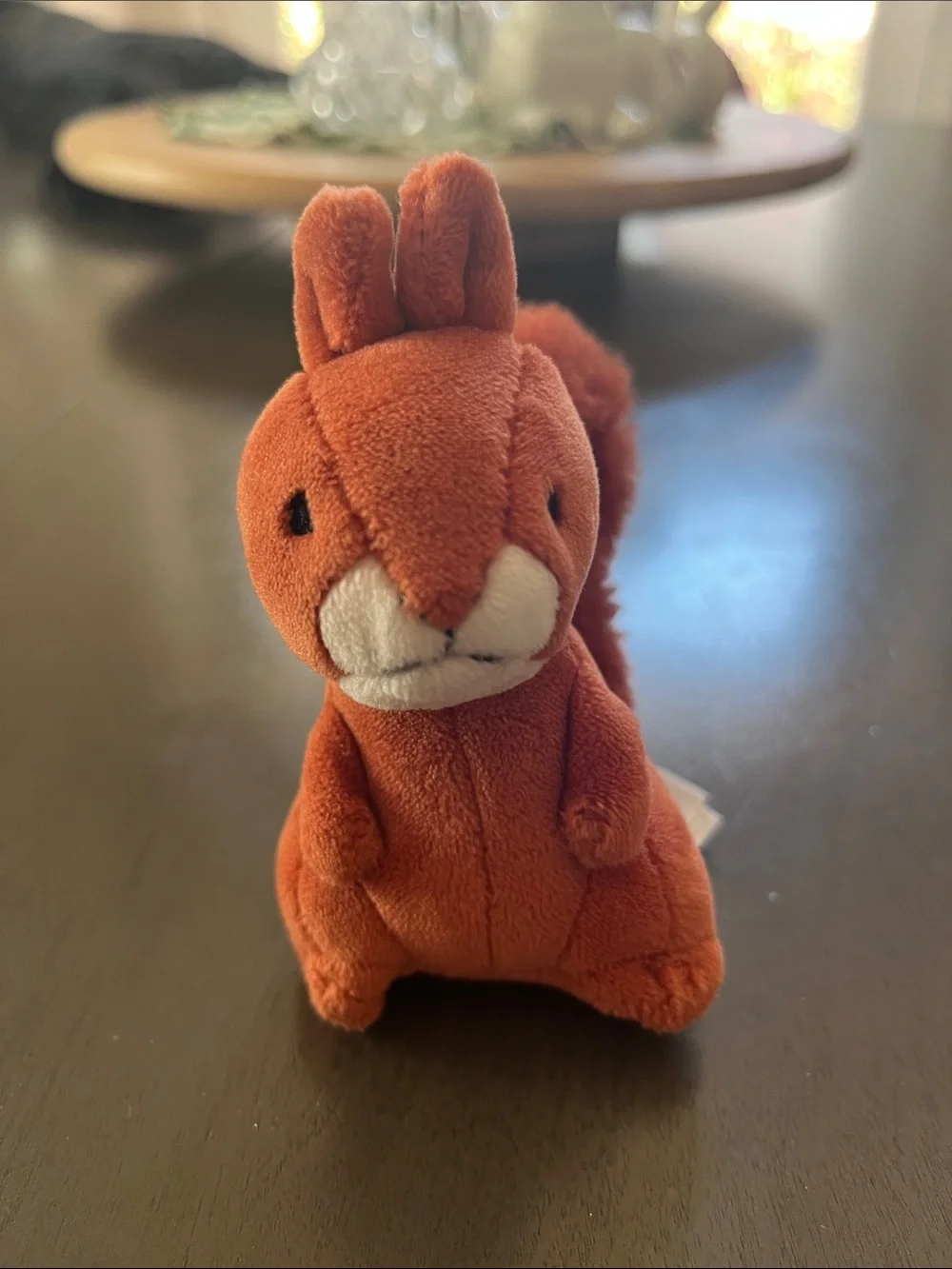 Jellycat Orange Squirrel with Fluffy Tail in Navy Plush Nest